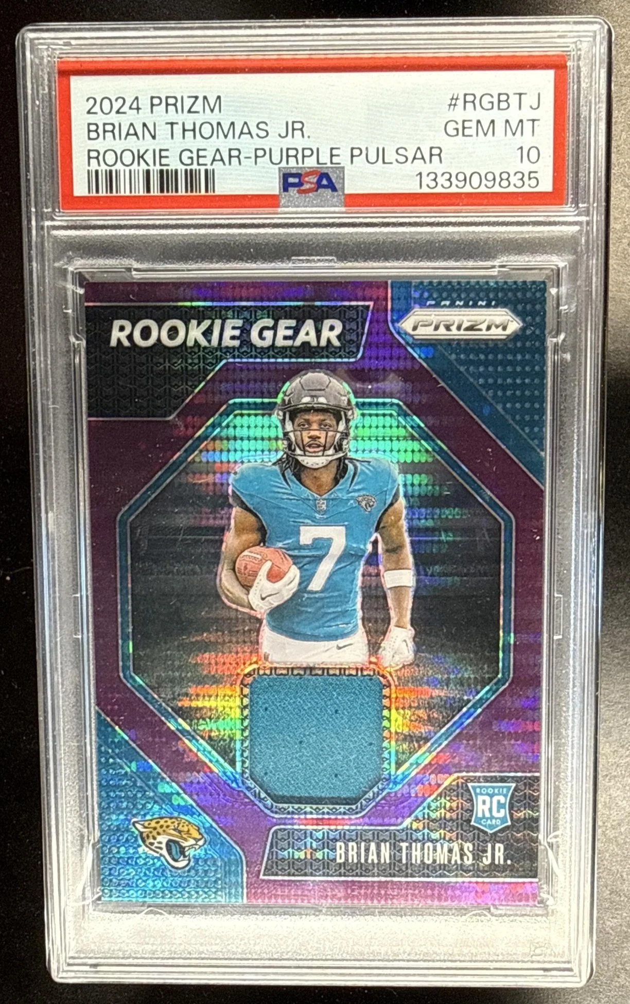 037_2024_PANINI_PRIZM_BRIAN_THOMAS_JR_RG_BTJ_ROOKIE_PURPLE_PULSAR_PATCH_RC_PSA_10.jpg