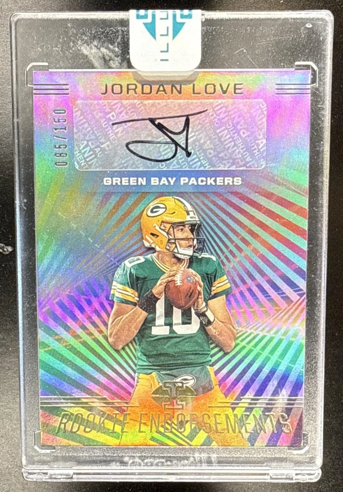 238_2020_PANINI_ILLUSIONS_JORDAN_LOVE_RE4_ROOKIE_ENDORSEMENTS_150_RC_AUTO.jpg