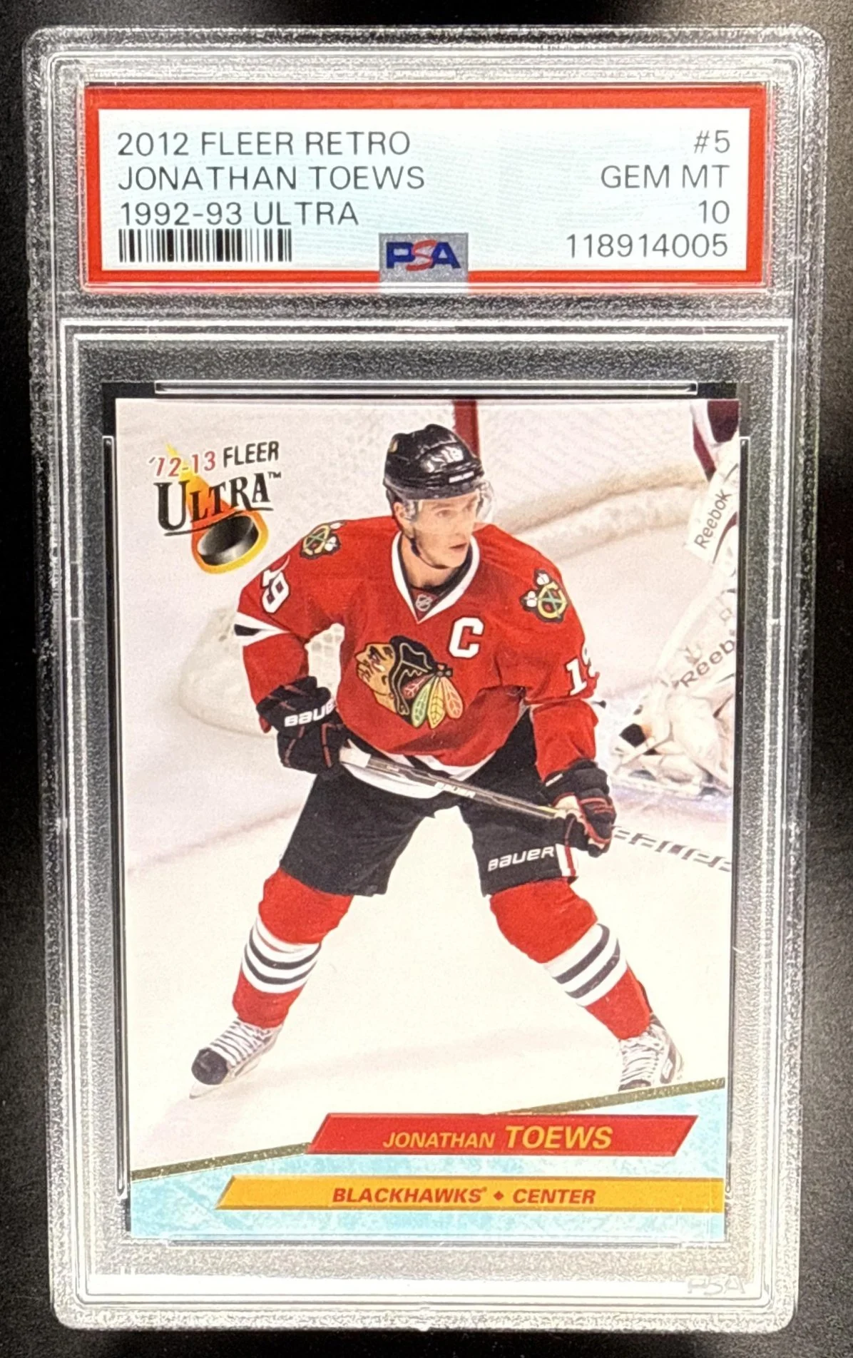 034_2012_FLEER_RETRO_5_JONATHAN_TOEWS_ULTRA_PSA_10.jpg