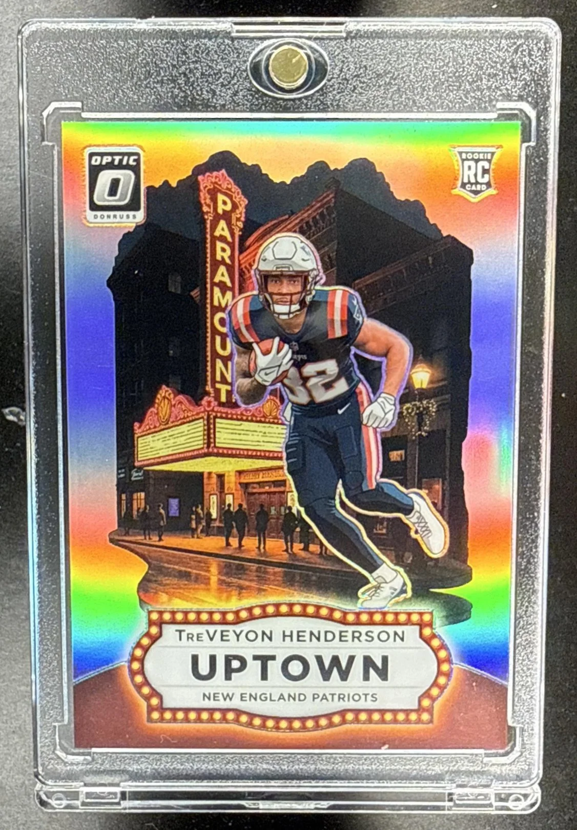 212_2025_PANINI_DONRUSS_OPTIC_TREVEYON_HENDERSON_23_UPTOWN_RC_PATRIOTS.jpg