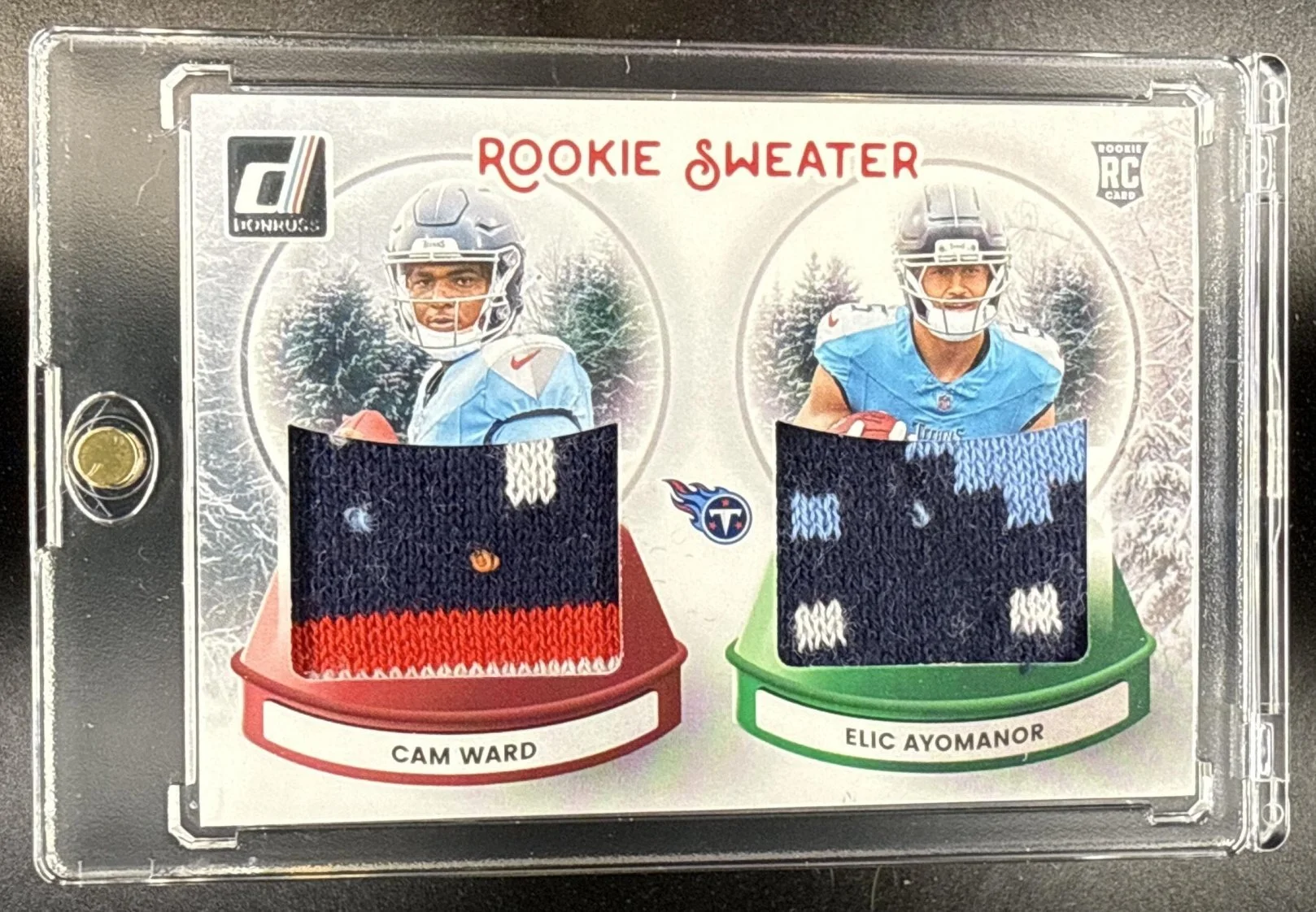 142_2025_PANINI_DONRUSS_CAM_WARD_ELIC_AYOMANOR_SWED_TEN_ROOKIE_HOLIDAY_SWEATER_DUAL.jpg