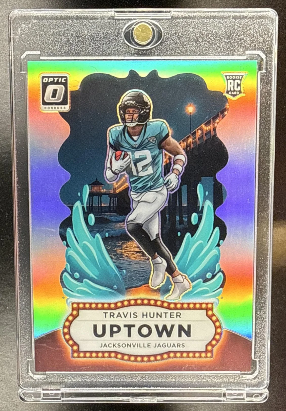 198_2025_PANINI_DONRUSS_OPTIC_TRAVIS_HUNTER_21_UPTOWN_RC_JAGUARS.jpg