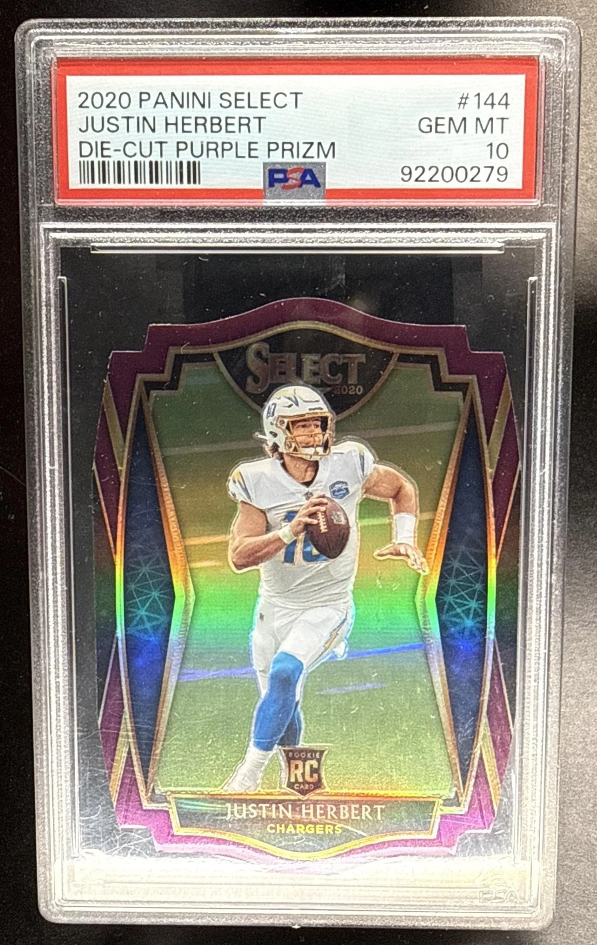 307_2020_PANINI_SELECT_JUSTIN_HERBERT_144_PURPLE_PRIZM_DIE_CUT_RC_LEVEL_PSA_10.jpg