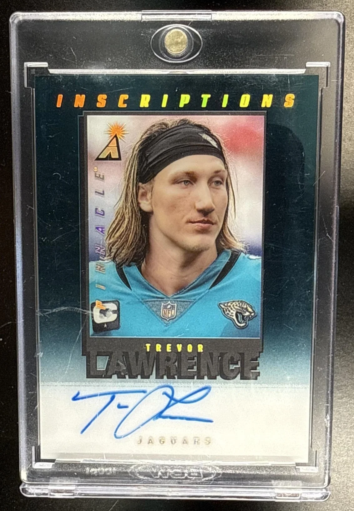 281_2021_PANINI_FOOTBALL_PL_TL_TREVOR_LAWRENCE_INSCRIPTIONS_AUTO.jpg