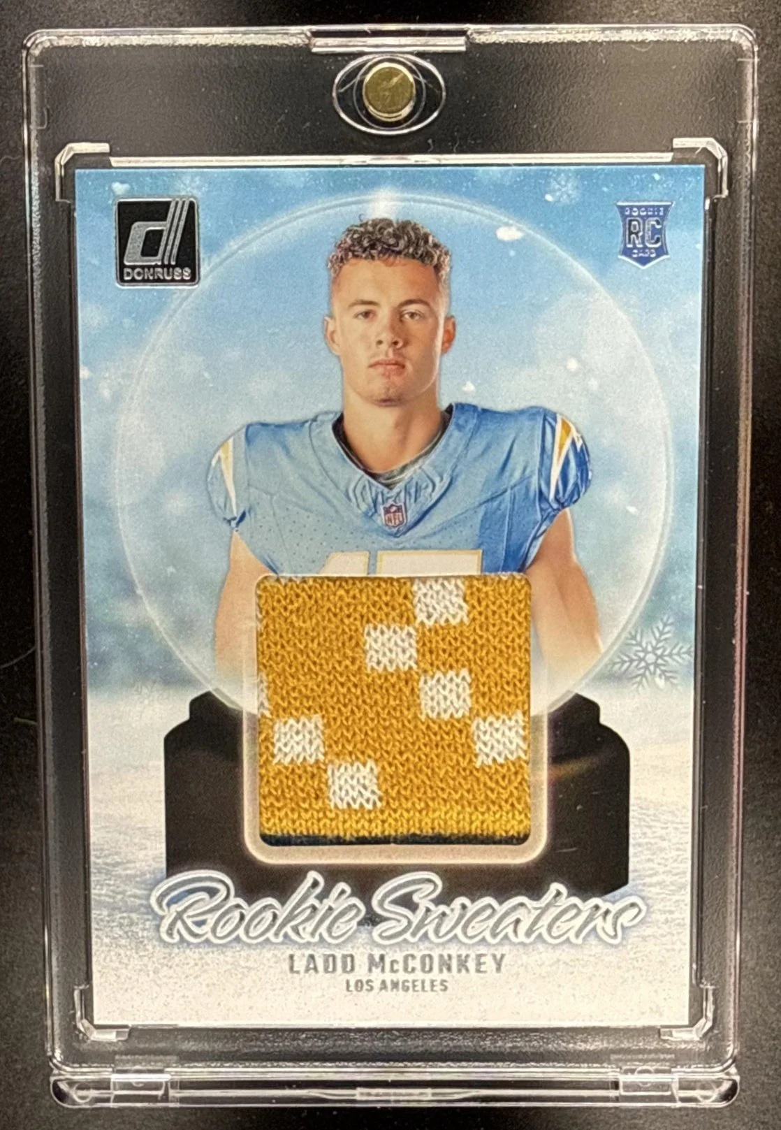 232_2024_PANINI_DONRUSS_LADD_MCCONKEY_RHS_LAD_ROOKIE_HOLIDAY_SWEATER_PATCH_RC.jpg