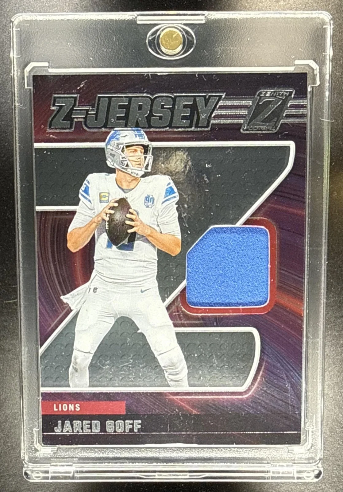 070_2024_PANINI_ZENITH_JARED_GOFF_ZJ_18_Z_JERSEY_PATCH_LIONS.jpg