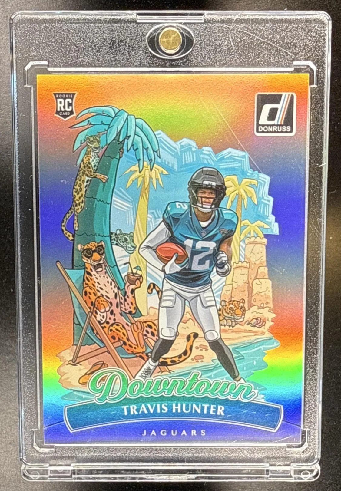 033_2025_PANINI_DONRUSS_TRAVIS_HUNTER_13_DOWNTOWN_SP_JAGUARS_RC.jpg