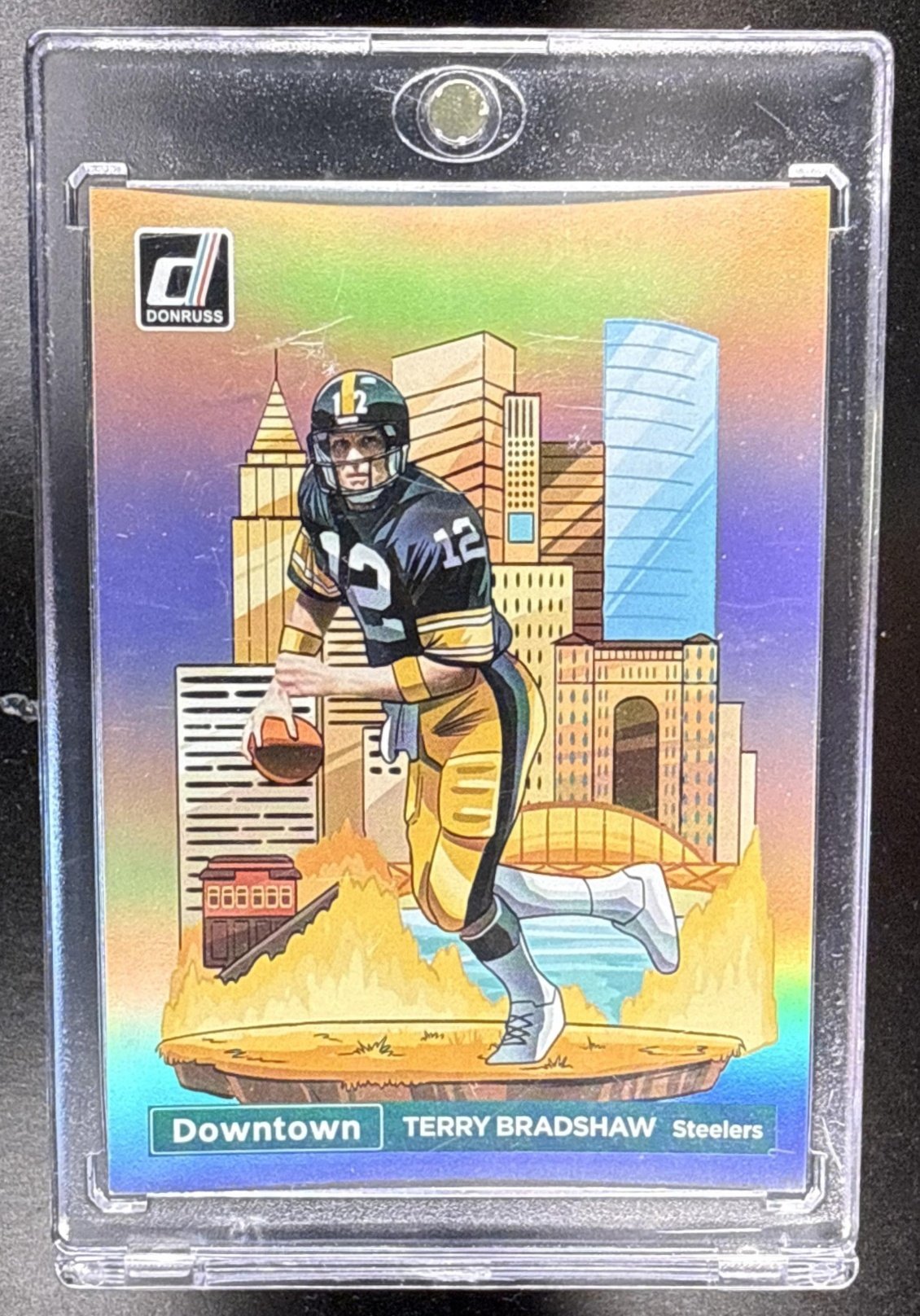 006_2024_PANINI_DONRUSS_TERRY_BRADSHAW_10_DOWNTOWN_SSP_STEELERS.jpg