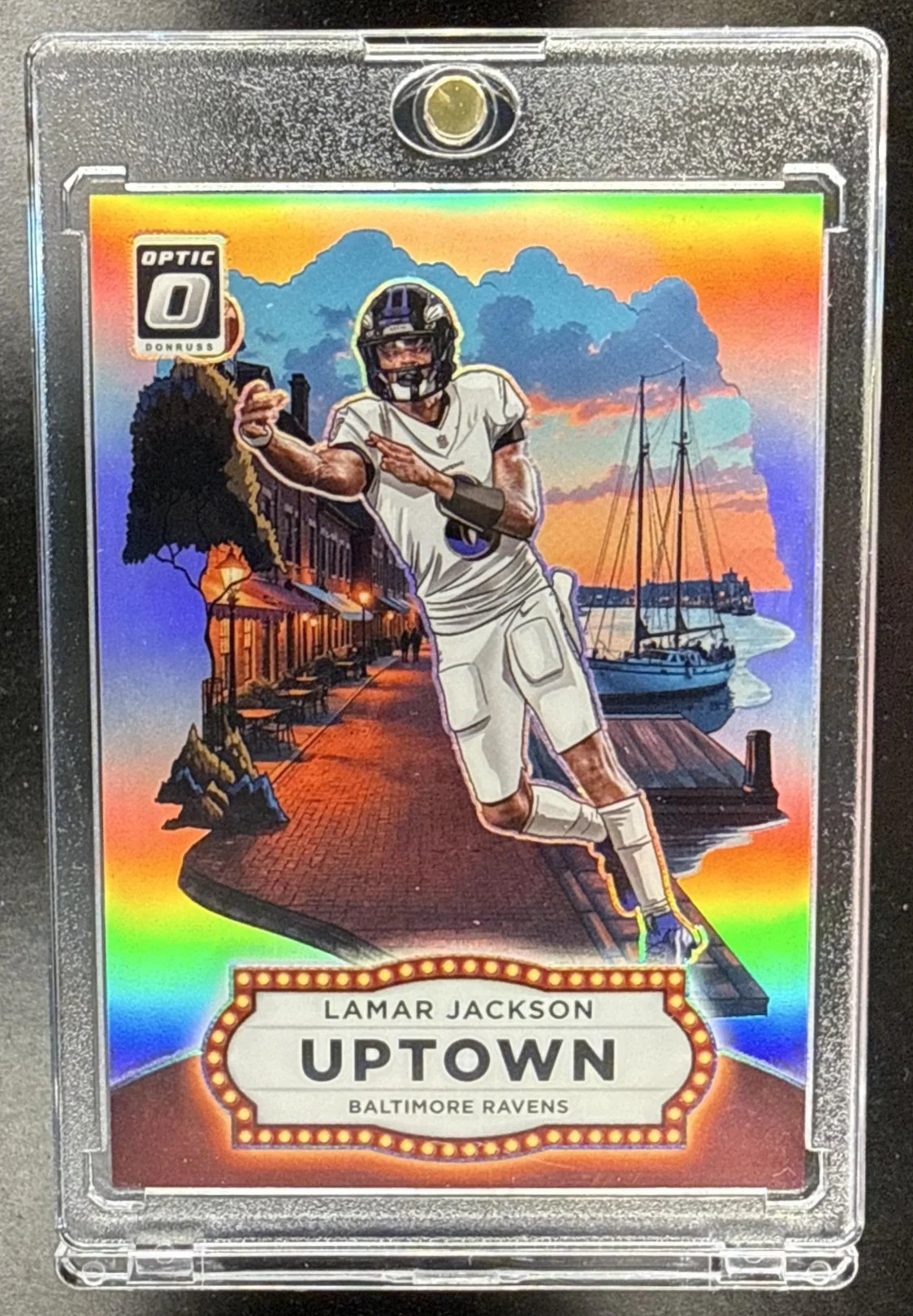 075_2025_PANINI_DONRUSS_OPTIC_LAMAR_JACKSON_13_UPTOWN_RAVENS.jpg