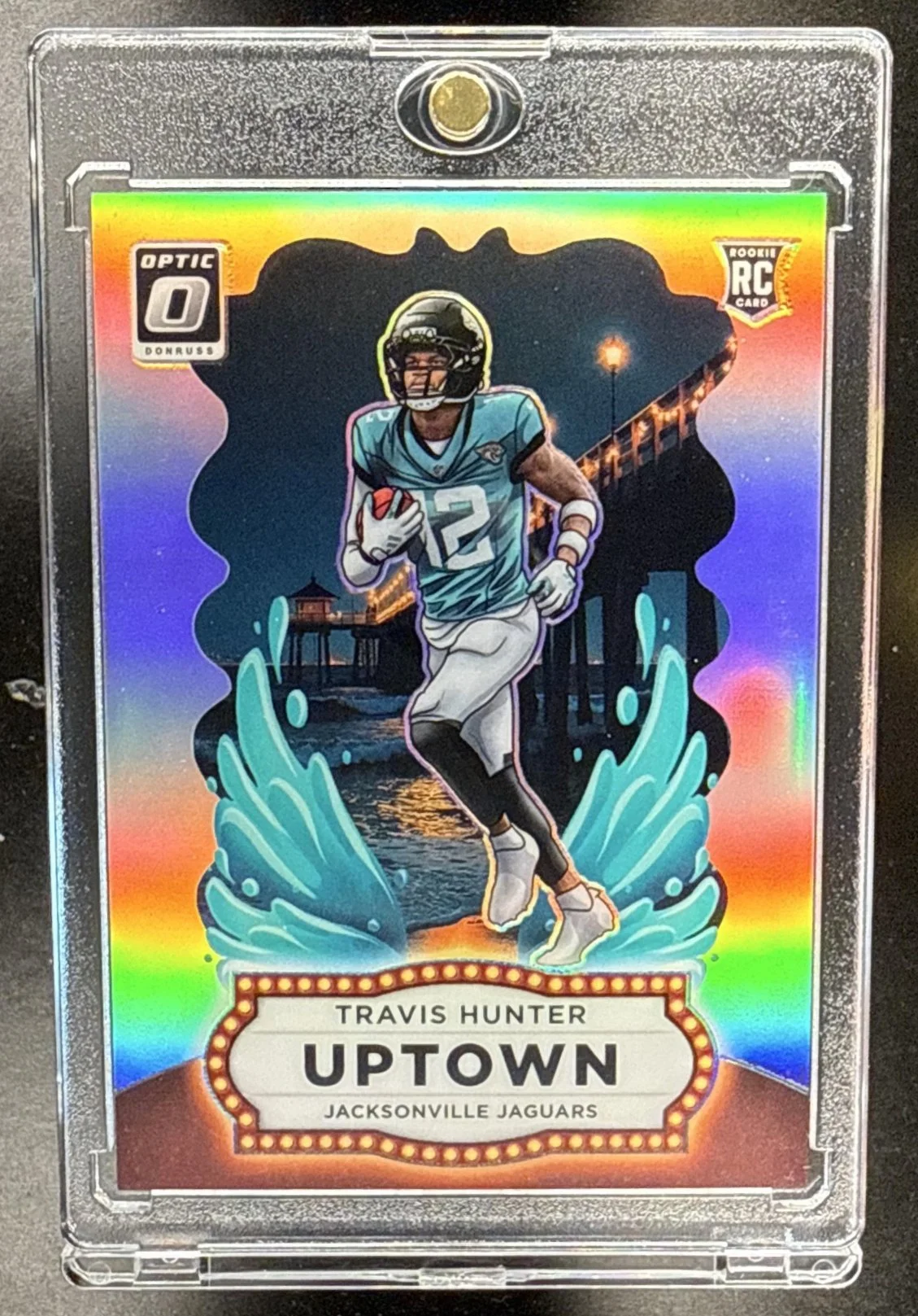 223_2025_PANINI_DONRUSS_OPTIC_TRAVIS_HUNTER_21_UPTOWN_RC_JAGUARS.jpg