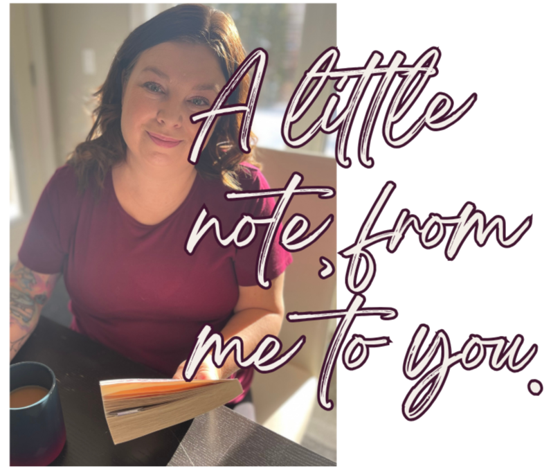 A woman with shoulder-length brown hair and tattoos on her arm, sitting at a table with a mug and a book, smiling softly, with text overlay that reads 'A little note from me to you.'