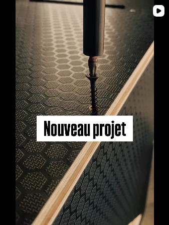 Image d'une perceuse électrique à surface hexagonale, avec un texte superposé 'Nouveau projet'.