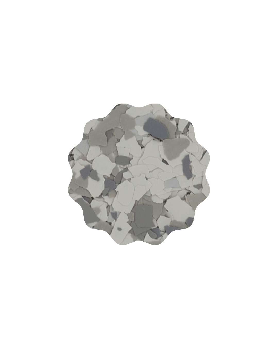 Close-up of irregularly shaped white and gray stones or chips.