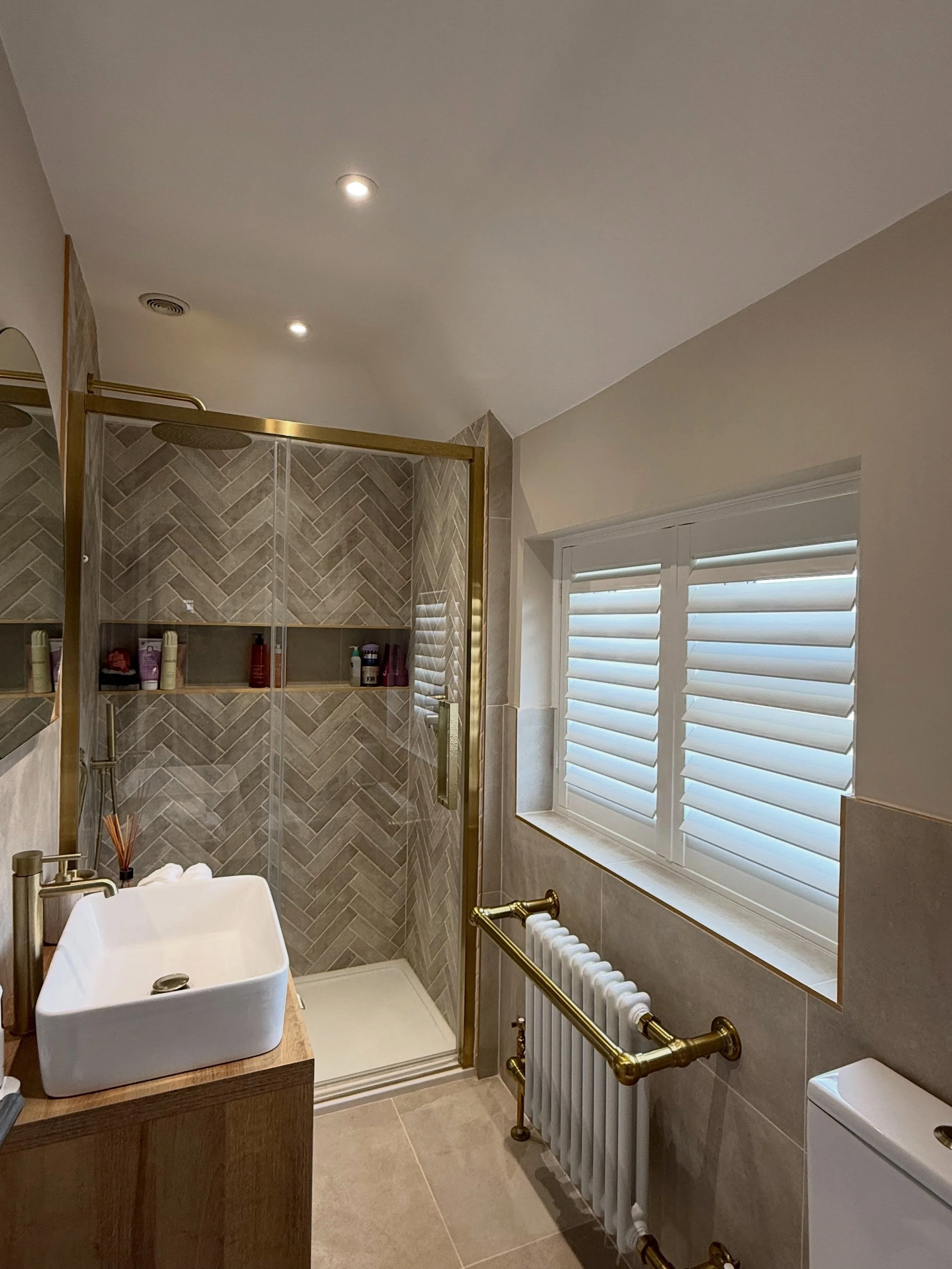 Recently fitted, a look at some of our recent installations! 

Bathroom shutters, built from the highest quality waterproof UPVC. The practical choice for moisture-prone spaces! 

Full Height shutters on an inward opening balcony door. Bi-folding nea