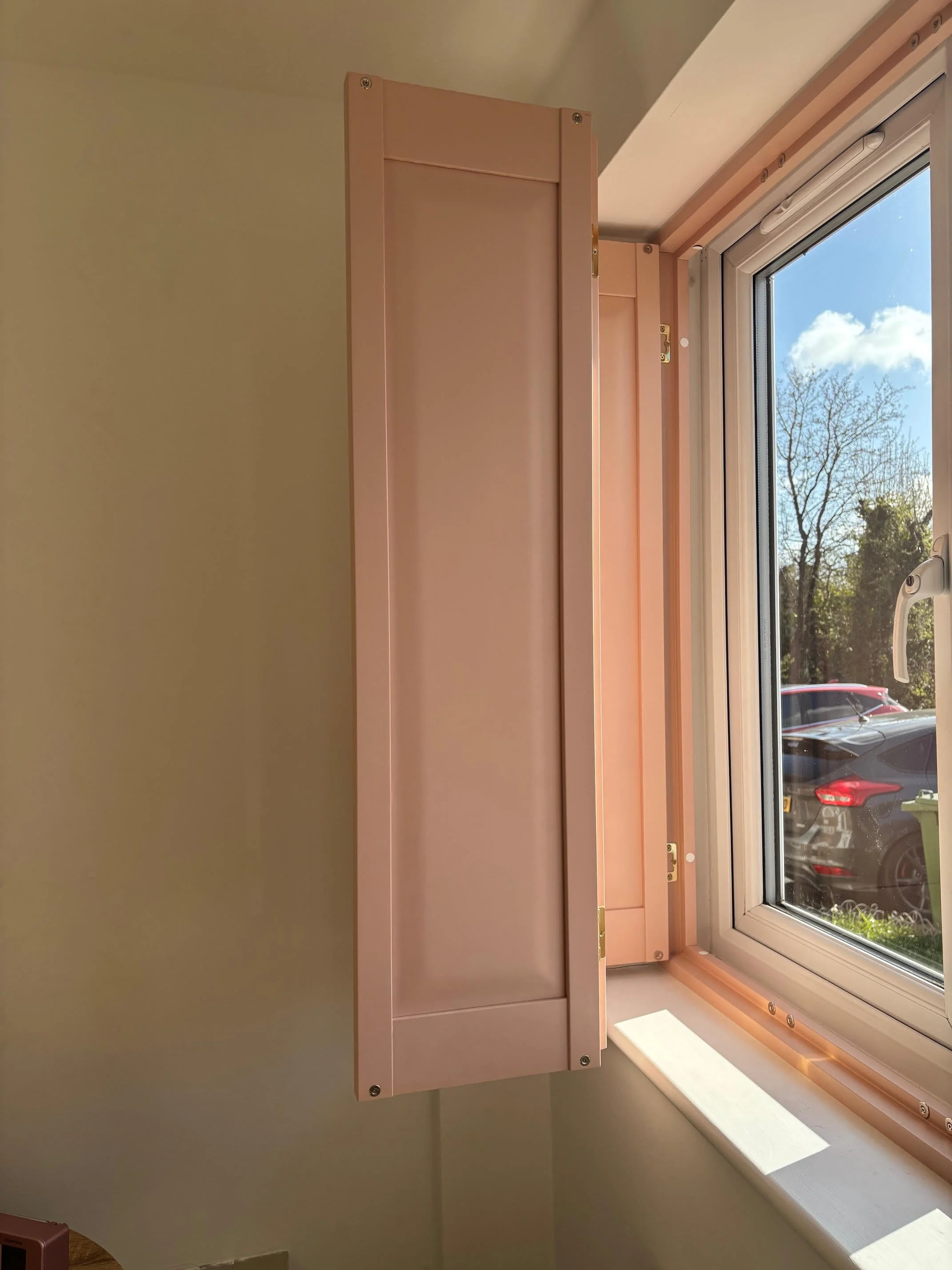 Pink-painted shutters solid panel