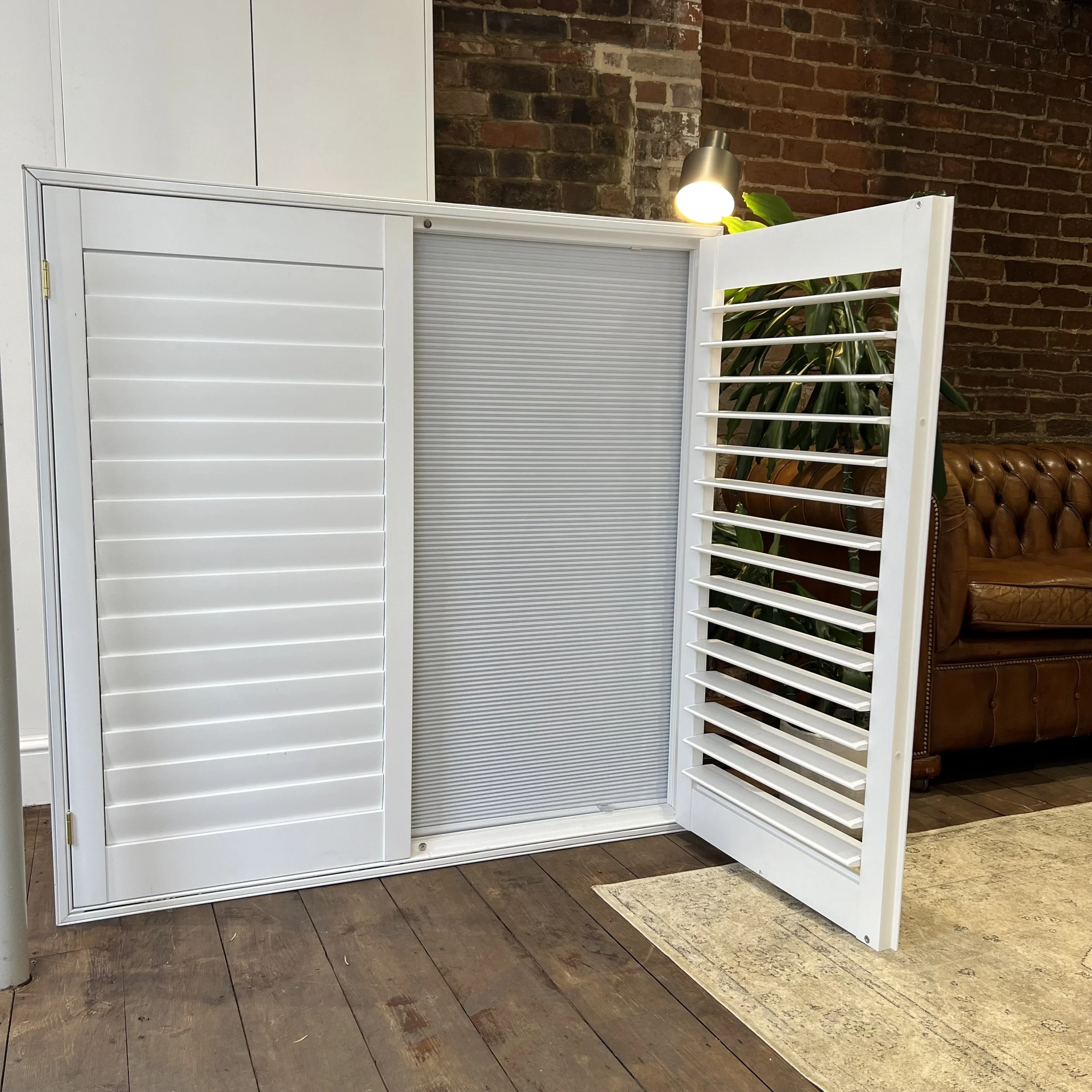 Shutters with an integrated blackout blind fully down