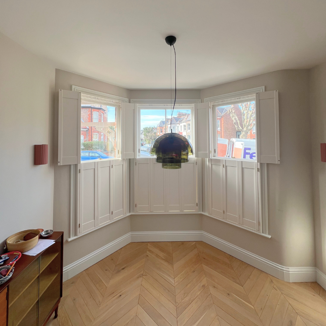 Tier on tier shutters top open solid panel
