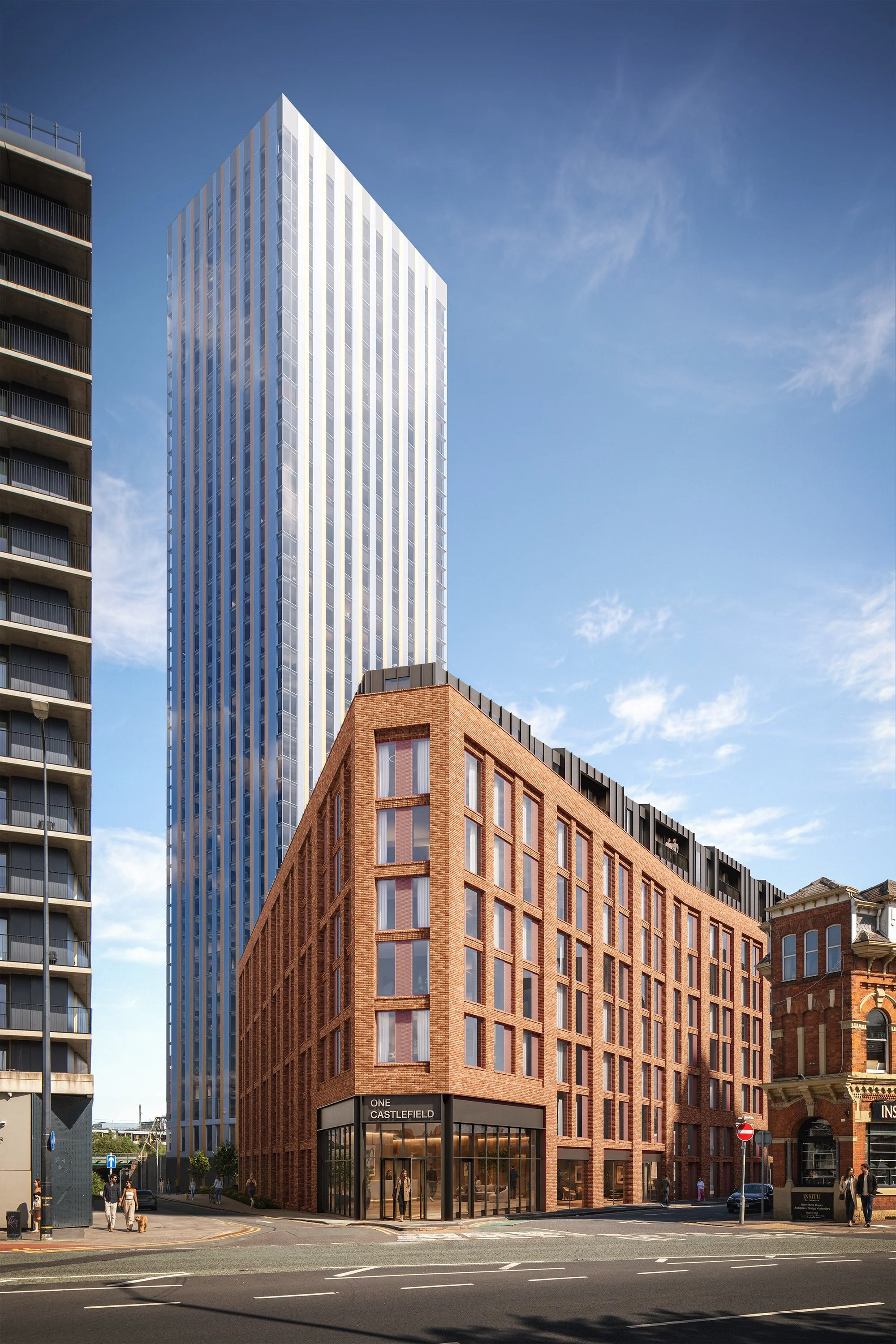 A city street with modern high-rise buildings, including a tall glass office tower, a red-brick commercial building, and a concrete apartment building, with pedestrians and cars on the street.