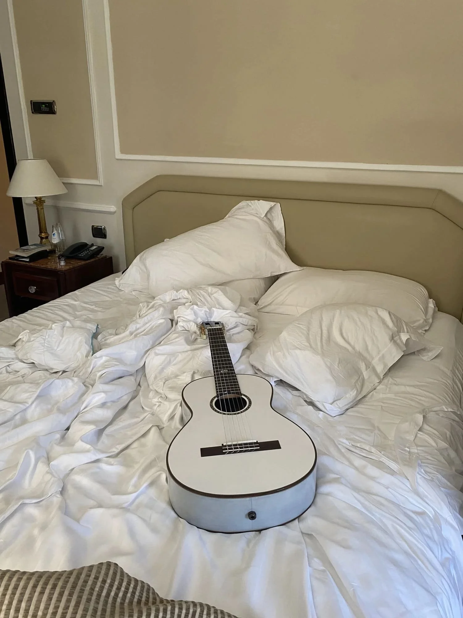 Dominic Miller on Tour with K Yairi Grace in a bed