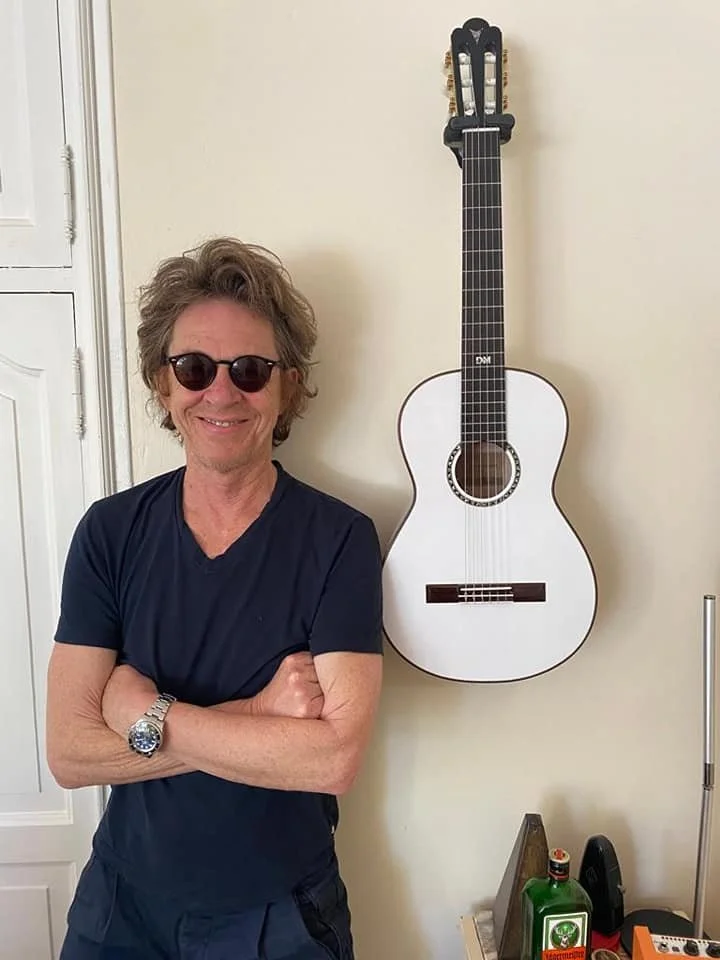 Dominic Miller posing with Grace for the first time.