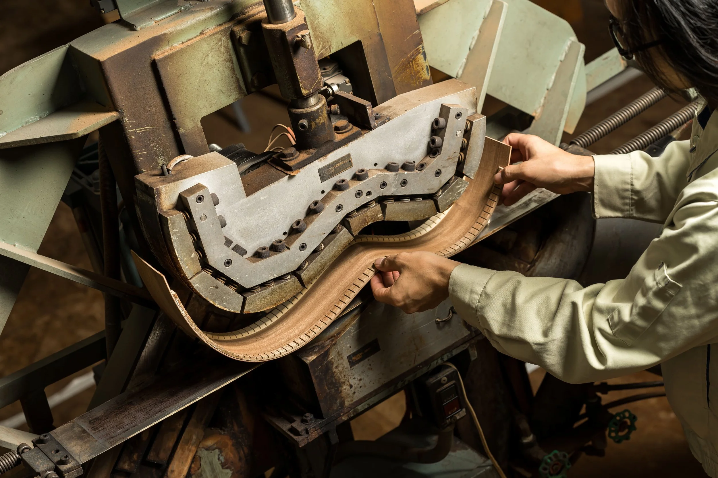 k_yairi_guitars_manufacturer_making_a_guitar.jpg