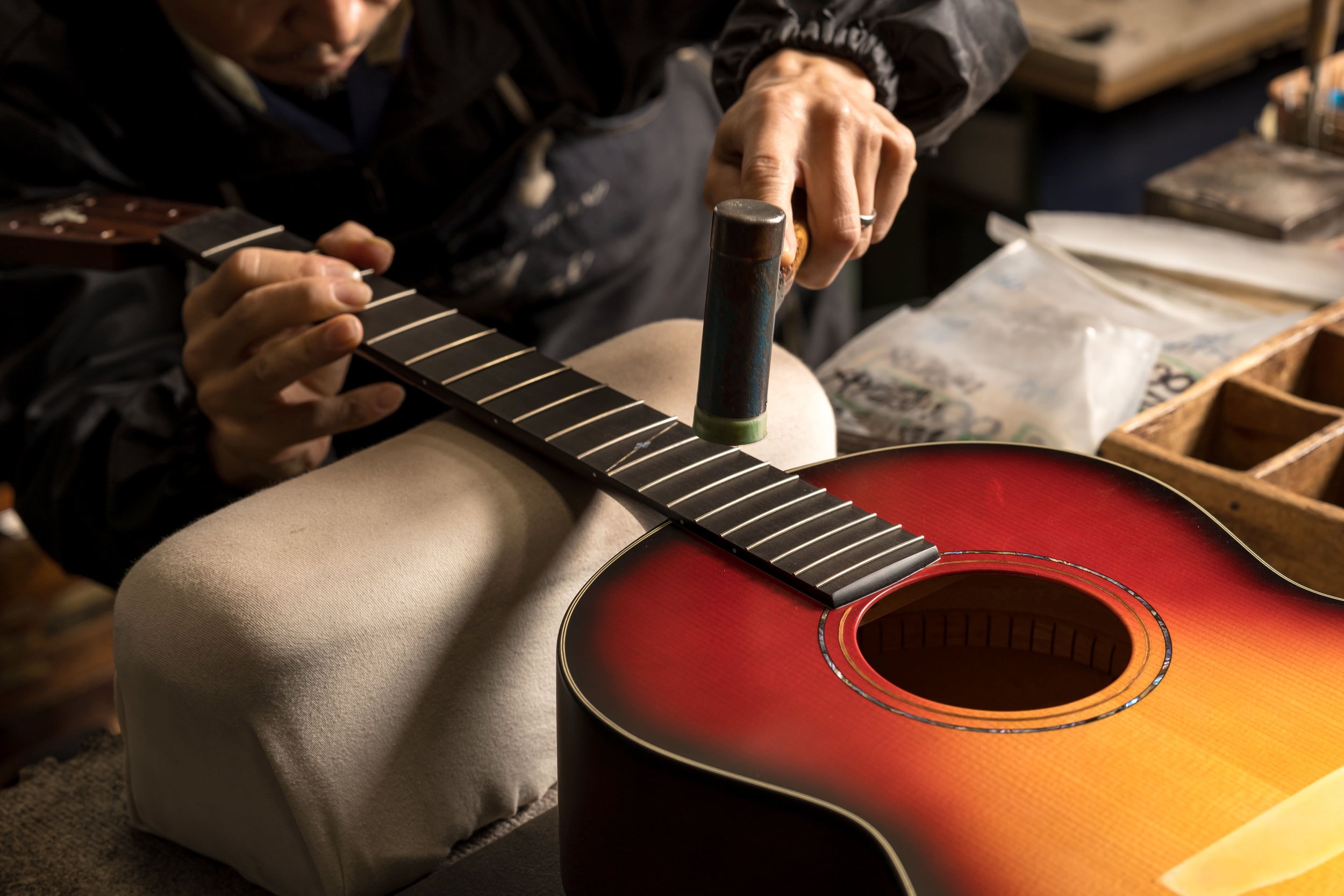 k_yairi_guitars_manufacturer_working_on_a_guitar.jpg