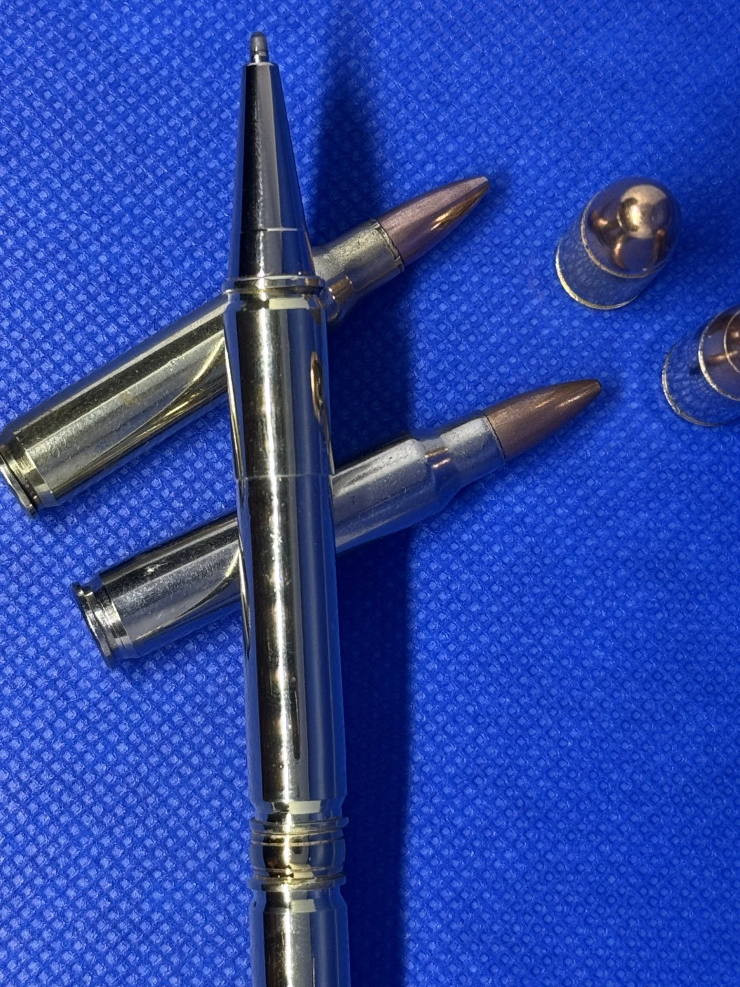 The AFO pen.  Made with two 9mm and two .223 once fired casings press fit together and made into a twist pen.  These calibres and those most commonly carried by Authorised Firearms Officers in the UK which is from where the name is derived.  