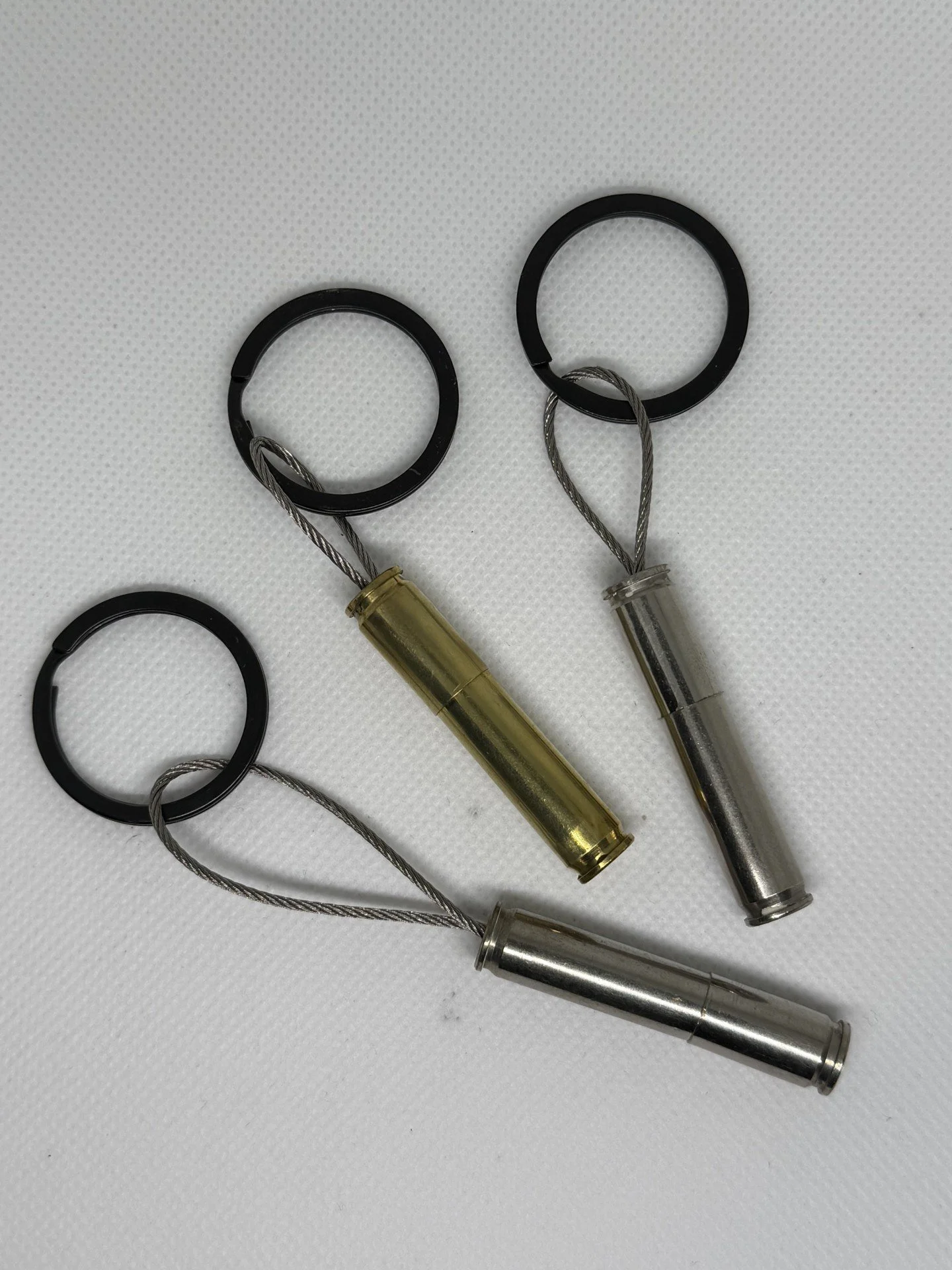 Key rings made from once fire brass casings.