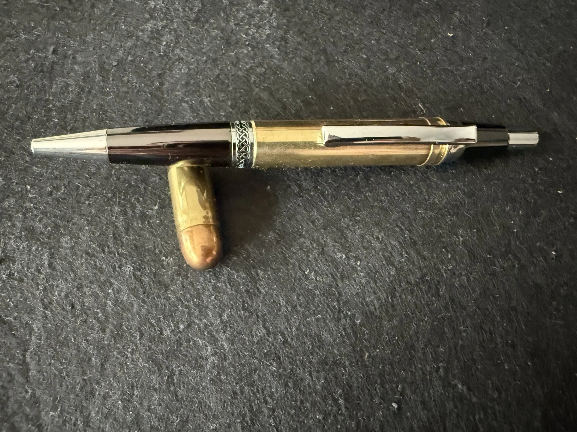 .300 MEN click pen in gun metal.