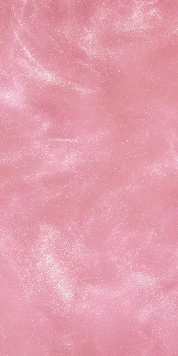 Fundo rosa brilhante com partículas de glitter dispersas