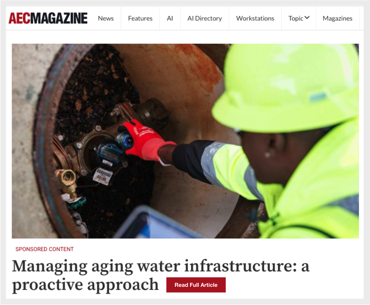 A worker wearing a yellow safety vest and helmet inspecting a water pipeline in a manhole.