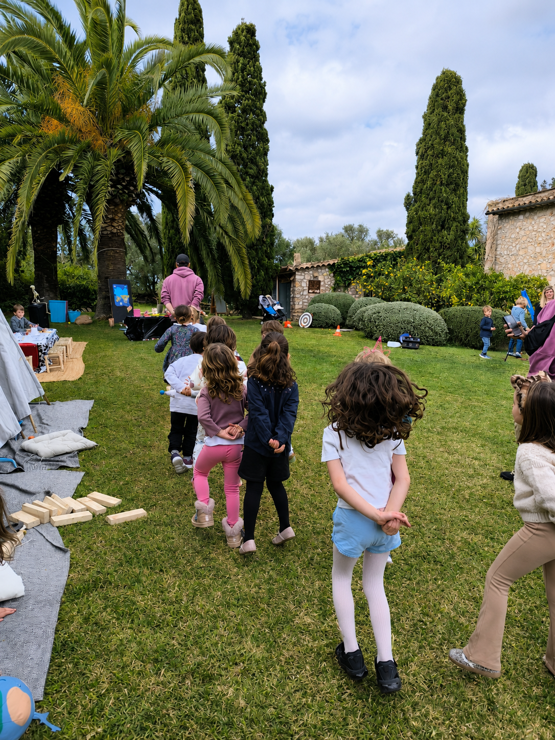 Children playing a dance game at a Norivan birthday party in Campos, Mallorca