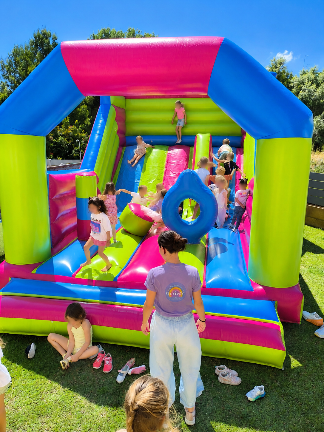 Children enjoying a supervised Norivan bouncy castle at a kids’ party in Palma, Mallorca.