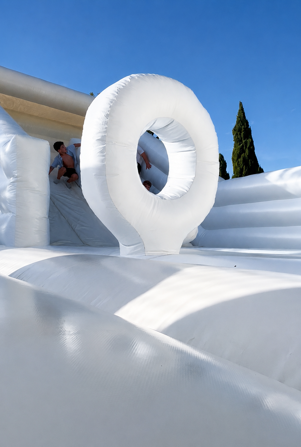 Big White bouncy castle hire for a finca wedding in Establiments, Mallorca