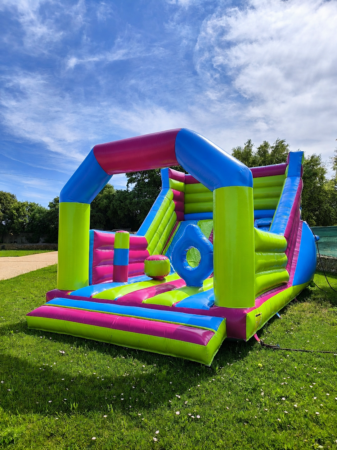 Norivan multicoloured bouncy castle with slide for rent in Mallorca
