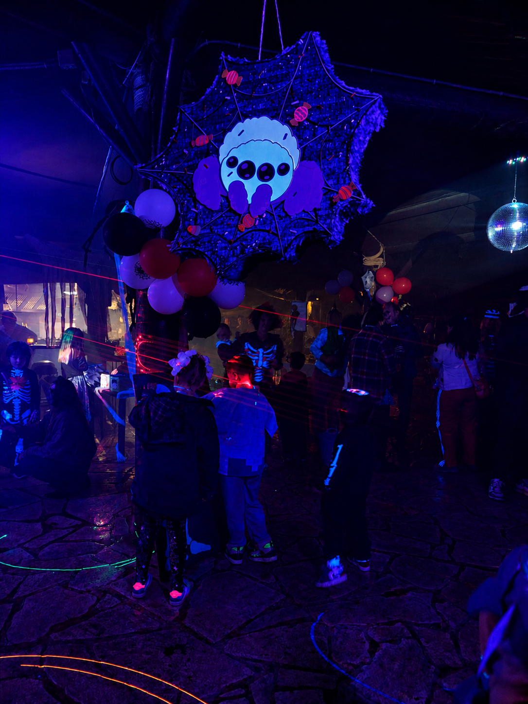 Norivan Halloween party with neon glow Mini Disco lights and piñata in Cala Figuera, Mallorca