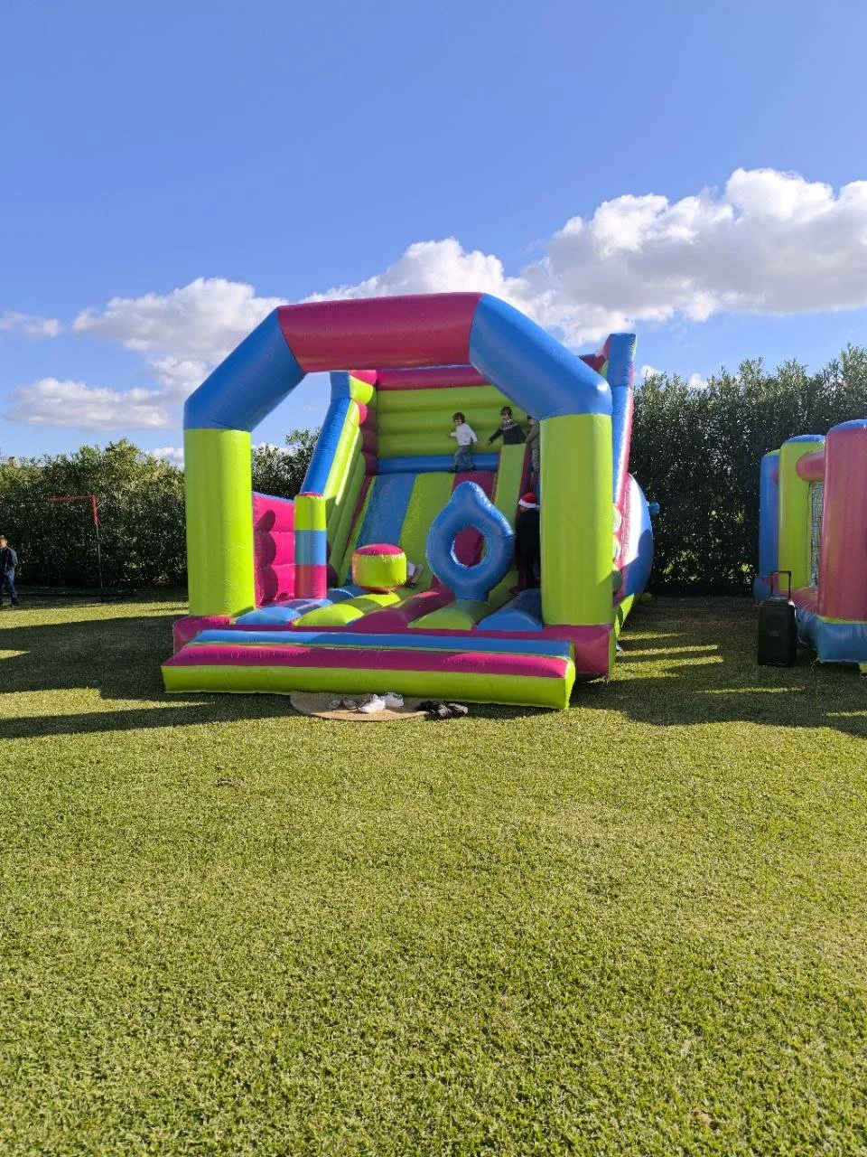 Norivan multicoloured bouncy castle with slide at a communion finca in Mallorca