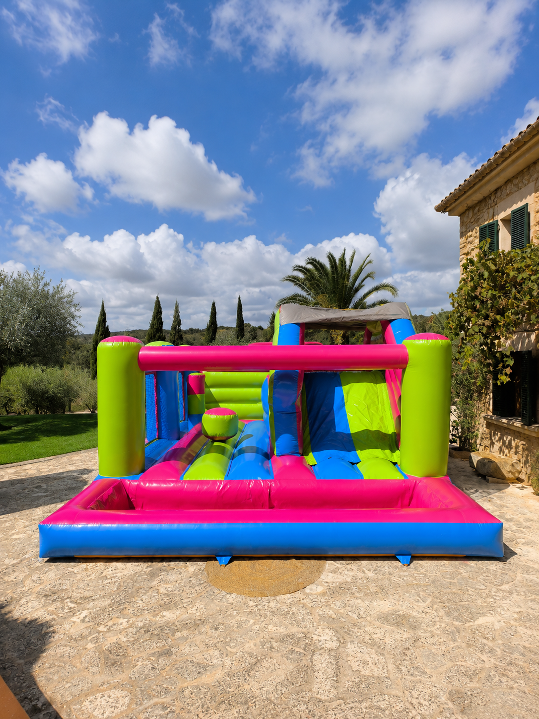 Multicoloured bouncy castle rental for a private event in Mallorca