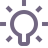 Simple purple lightbulb icon representing ideas or inspiration.