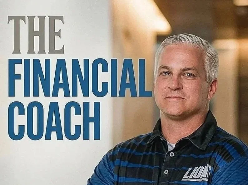 Cover image with the text 'The Financial Coach' and a man with gray hair wearing a blue and black plaid shirt, standing indoors with a blurred background.