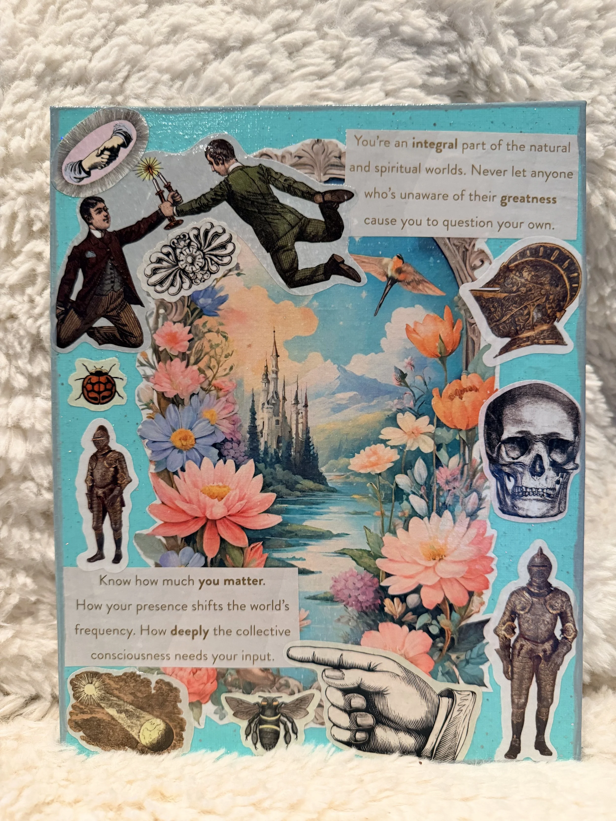 A collage of vintage illustrations and photographs with flowers, a castle, a skull, a bee, a butterfly, and a hand with a pointing finger. There is also a quote about the importance of understanding one's own greatness and collective consciousness.