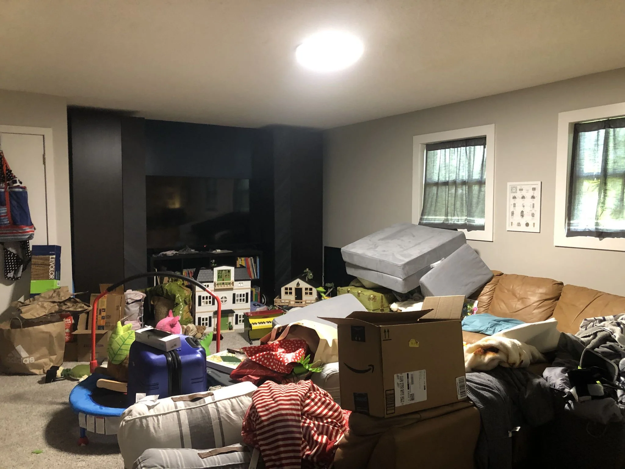 Before staging - This area needed to be decluttered, show off the space to open up the room so buyers could see the true value behind this room.