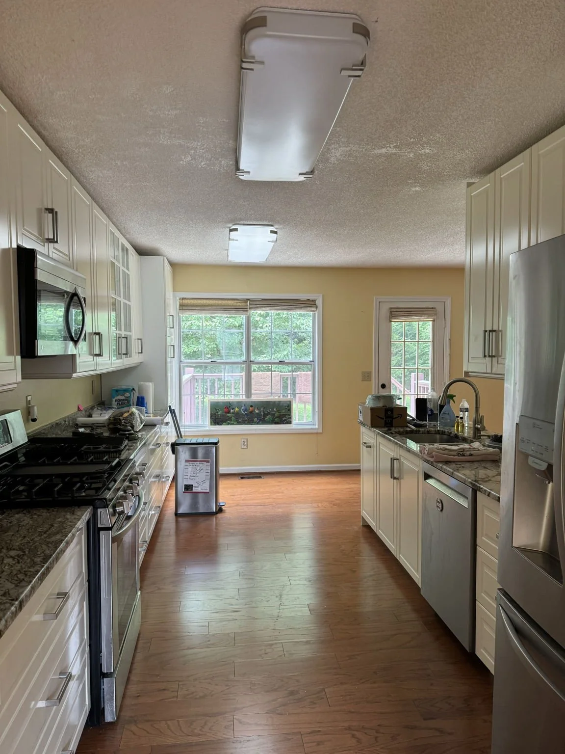 This area was redefined with purposeful staging to clarify function and improve visual flow of a smaller space.