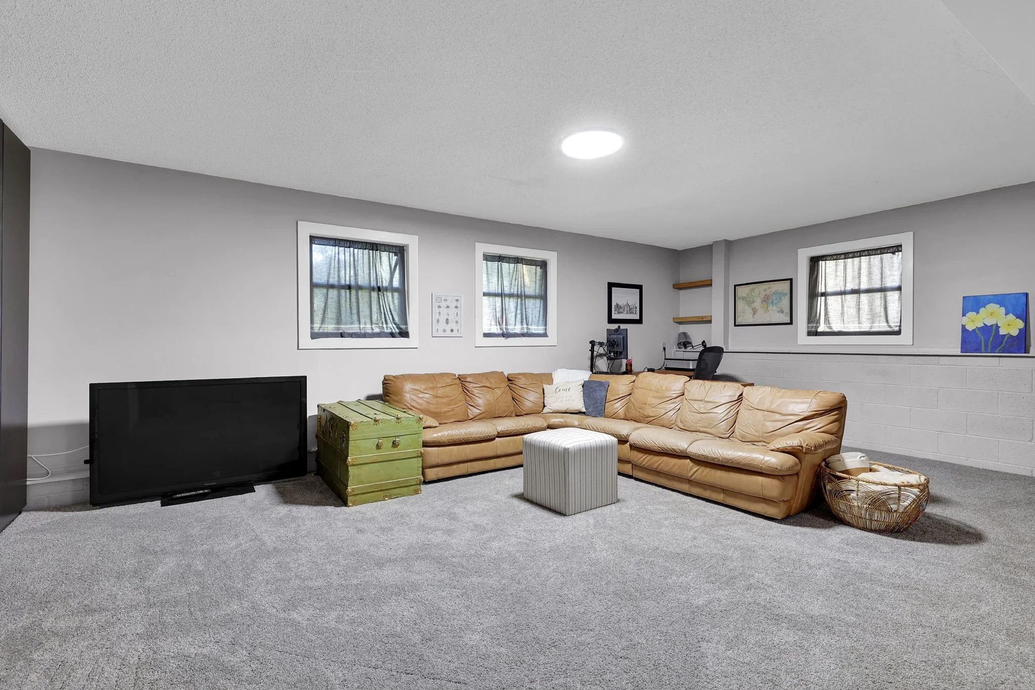 This space was reimagined through light staging, decluttering, and layout optimization to create a more open and inviting feel for buyers.