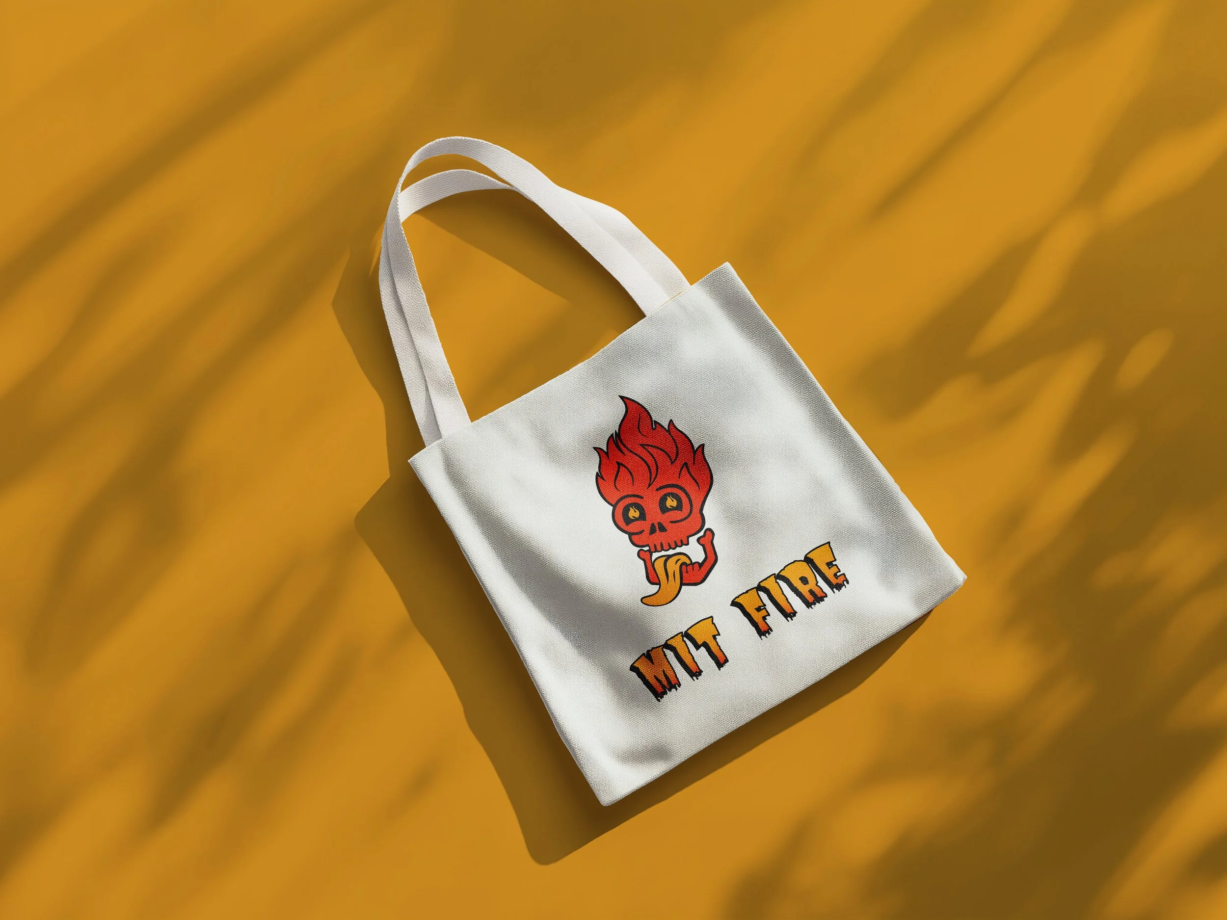 MIT FIRE tote_Bag_Mockup_on_the_Floor.jpg