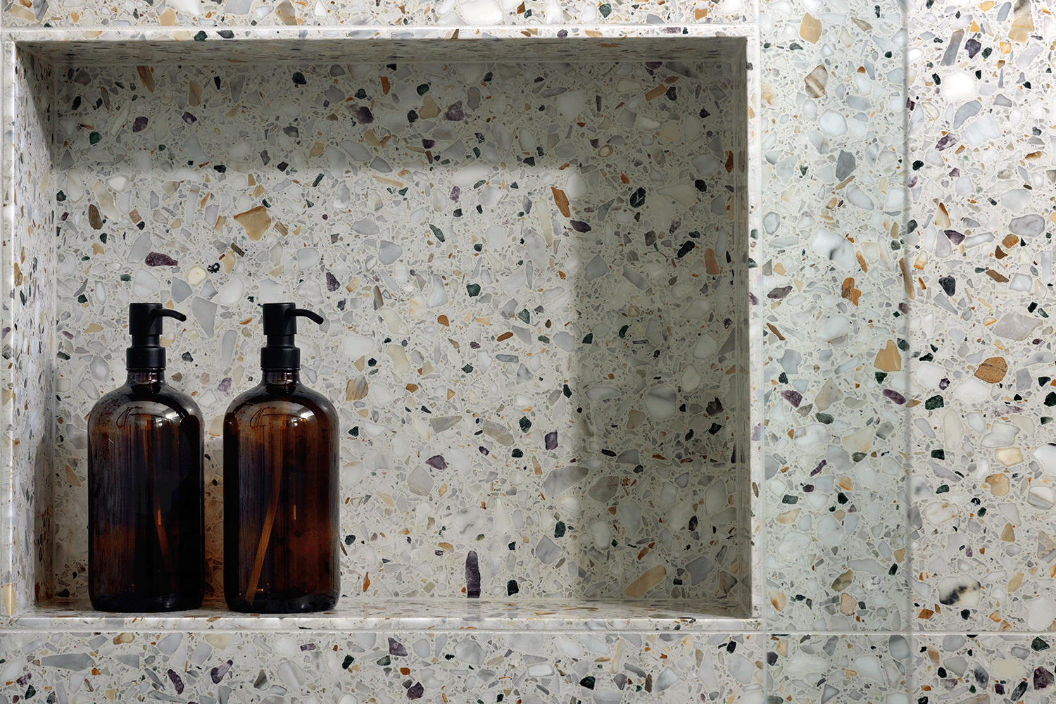 Custom terrazzo shower niche.