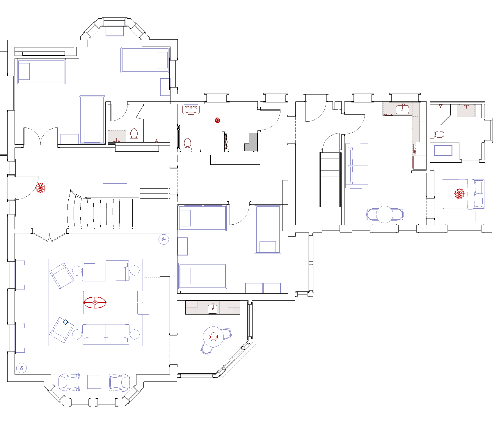 Floor plan of a house showing various rooms, including bedrooms, bathrooms, living areas, and a kitchen, all outlined with furnishings and fixtures.