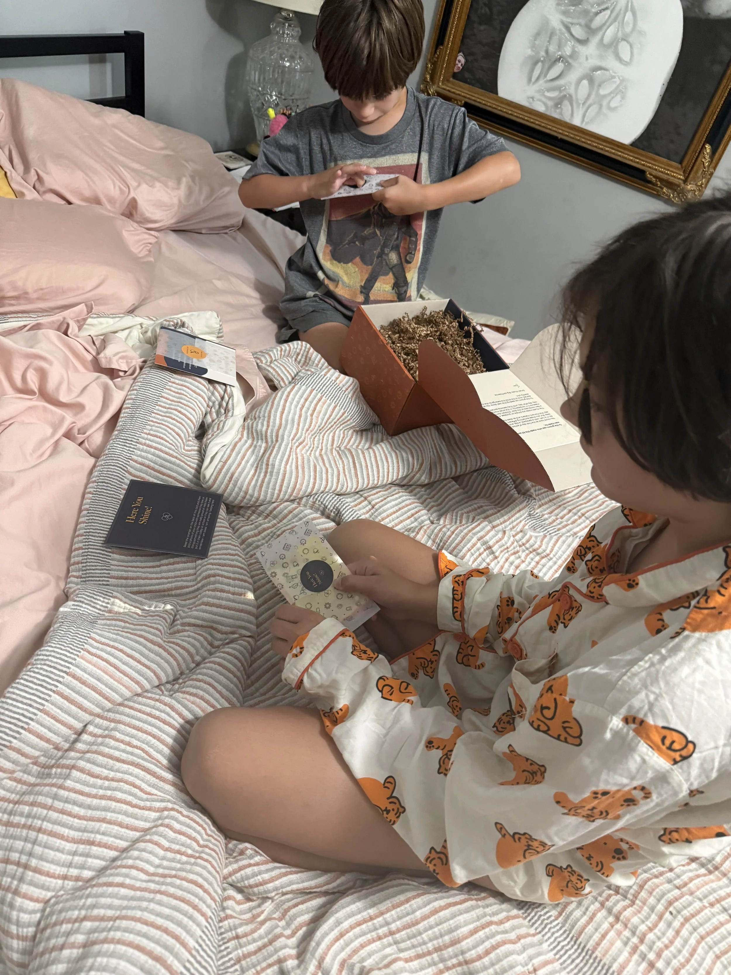 Two Siblings opening Milk and Coffee Kids kit 