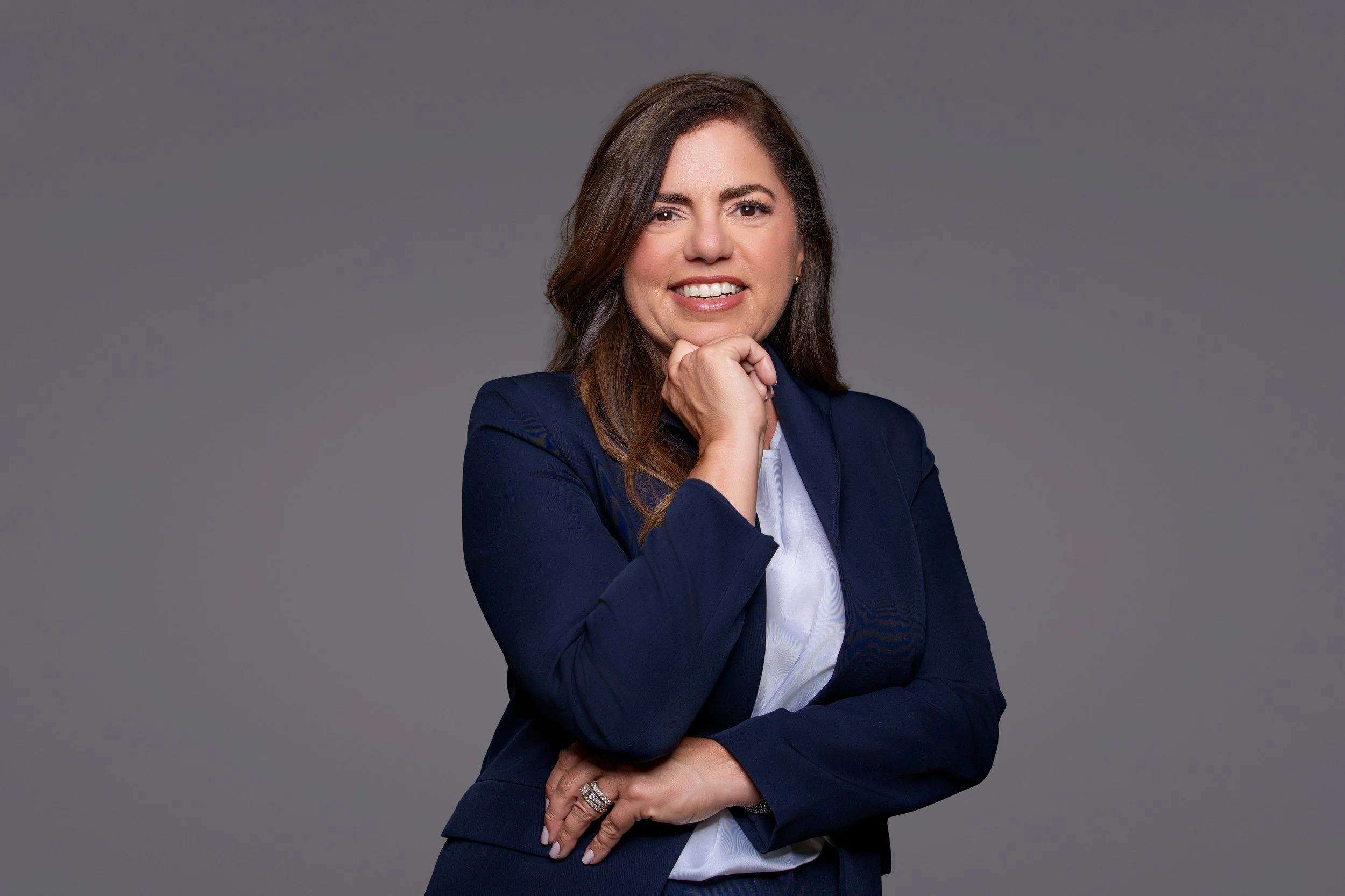 Headshot of Karen Veloz the Founder & President of Veloz Arts Academy.