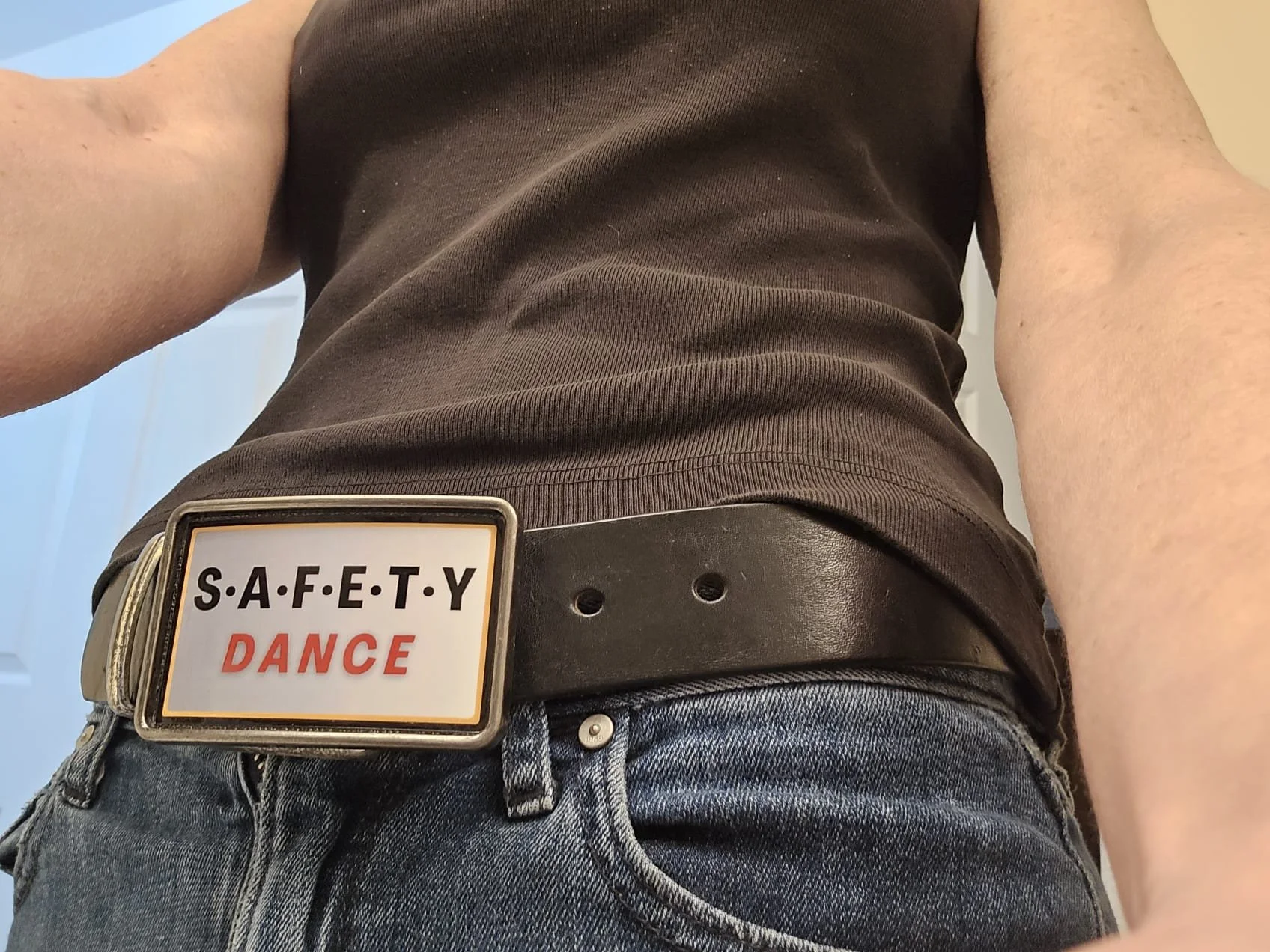 Claudia wearing belt buckle.jfif